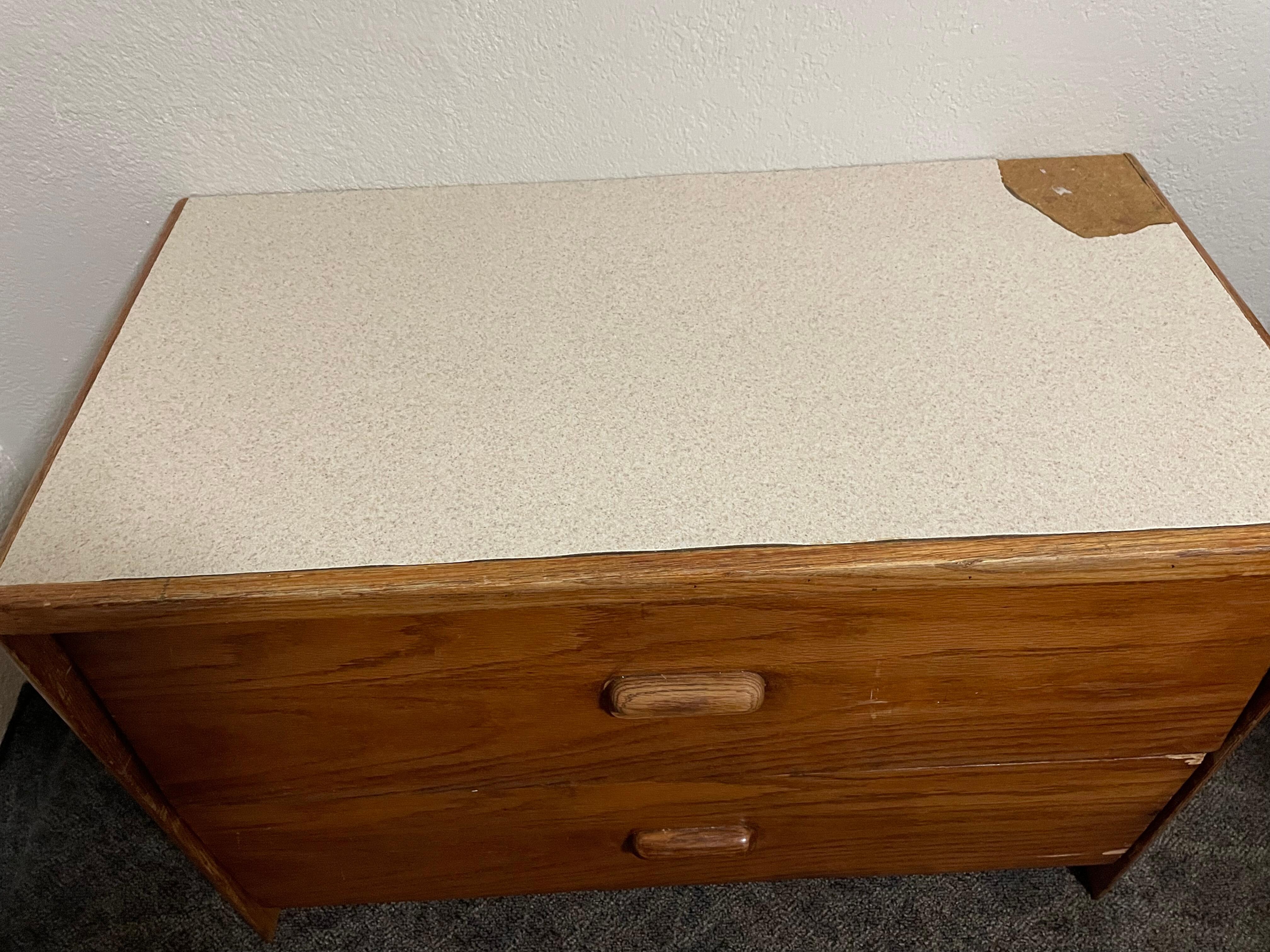 Formica top to chest of drawers broken 