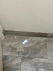 Hot sauce packet left in bathroom
