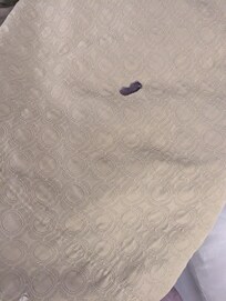 Cigarette burns on the blankets