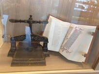 An original 15th century printing press and book...
