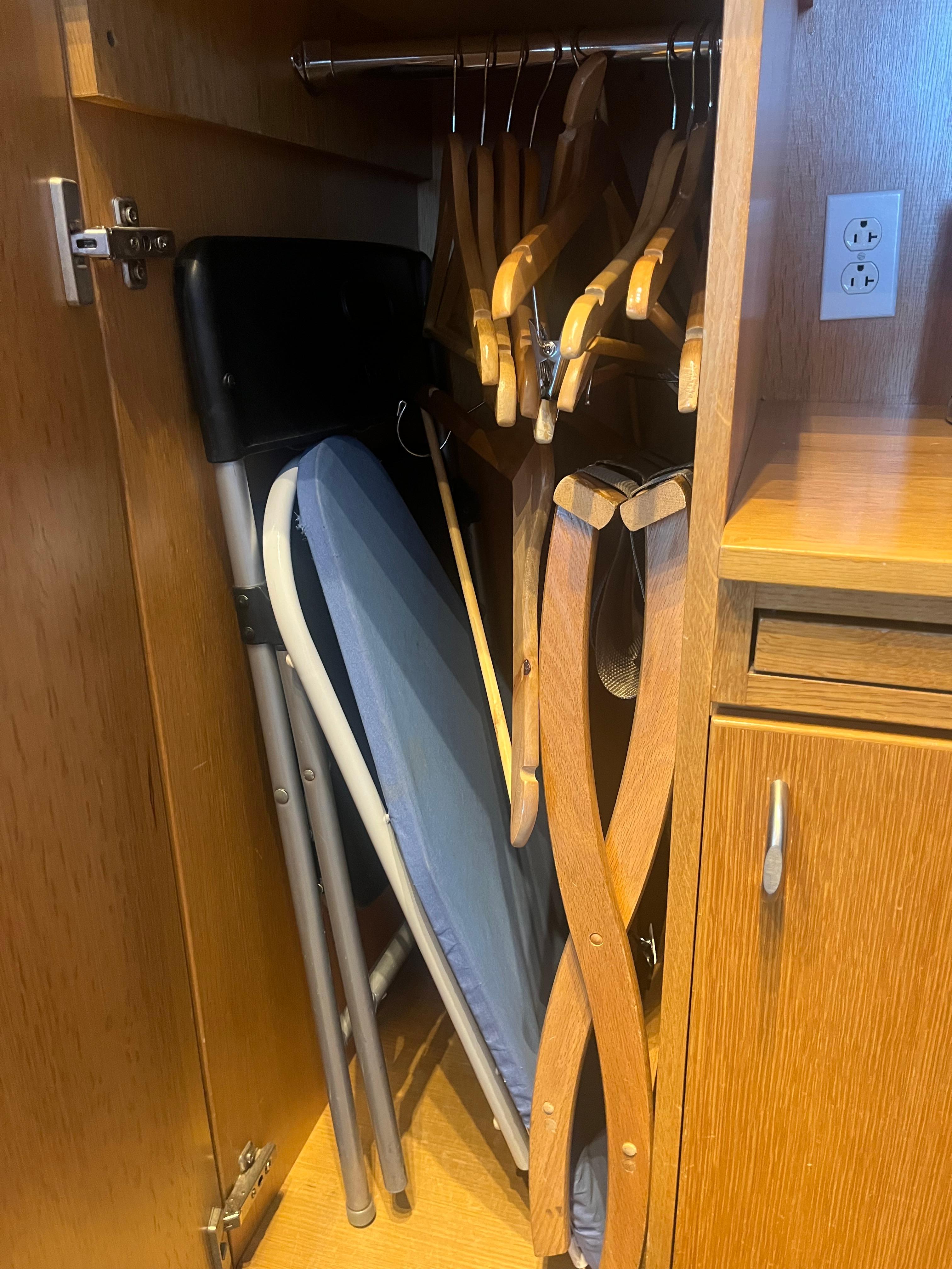 Hangers in this tiny cupboard - nowhere to hang any clothes