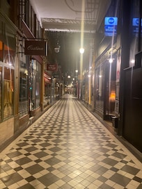 The indoor passage leading to the hotel (at night)