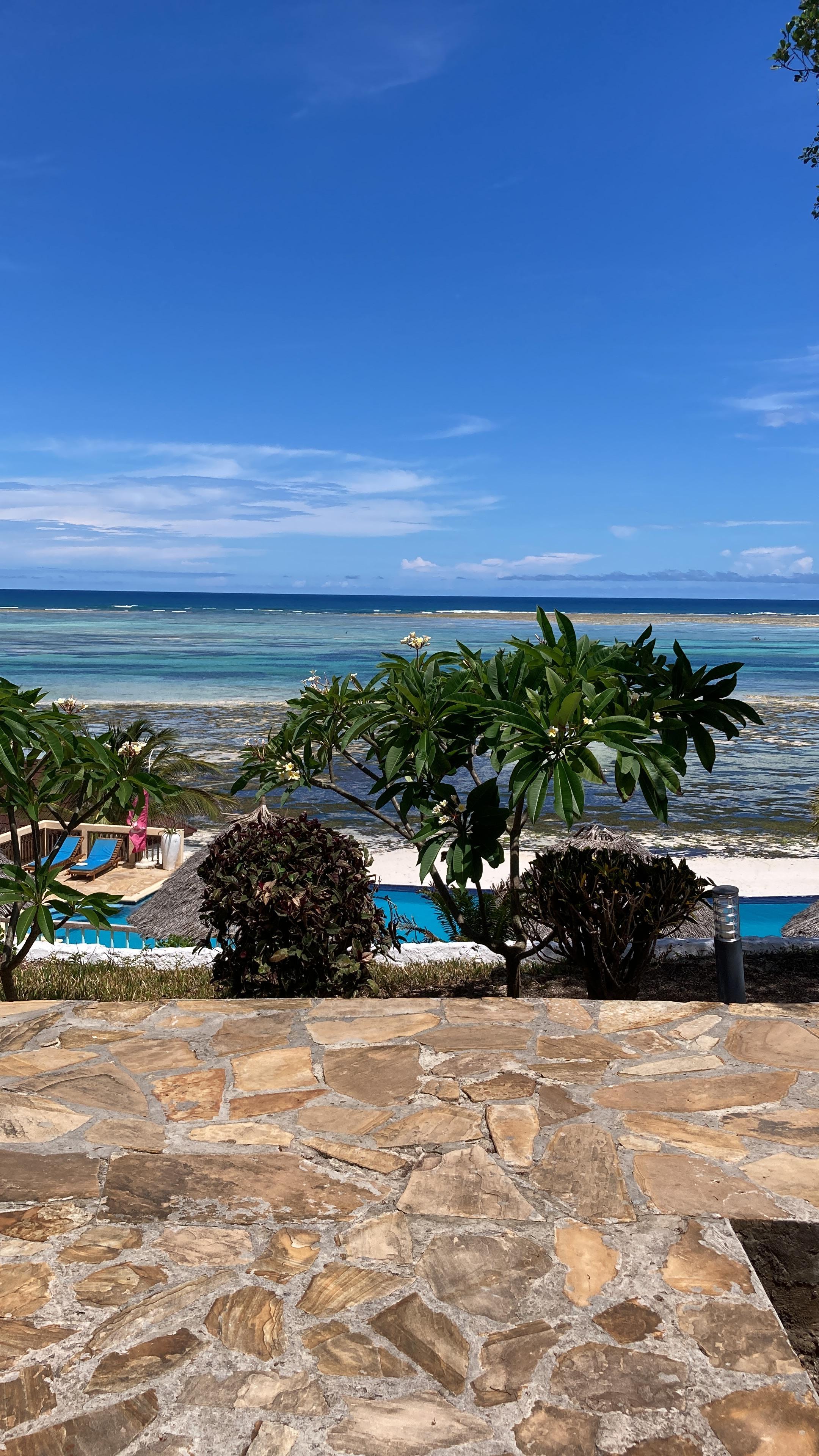 View over pool and ocean from our room