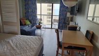 Murphy bed and Balcony with a Beachview