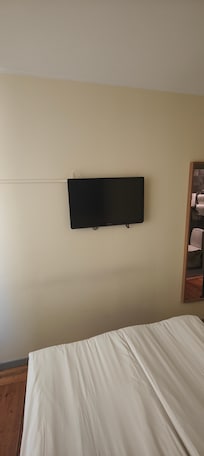 Scuffed walls, tiny tv