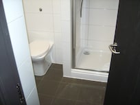 Neat shower room with lots of hot water but an overactive extractor fan which buzzes constantly - keep the door shut!