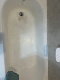 Bathtub dirty, painted with regular paint and peeling