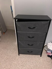 Drawers did not line up correctly because there was a bar missing to support top drawer