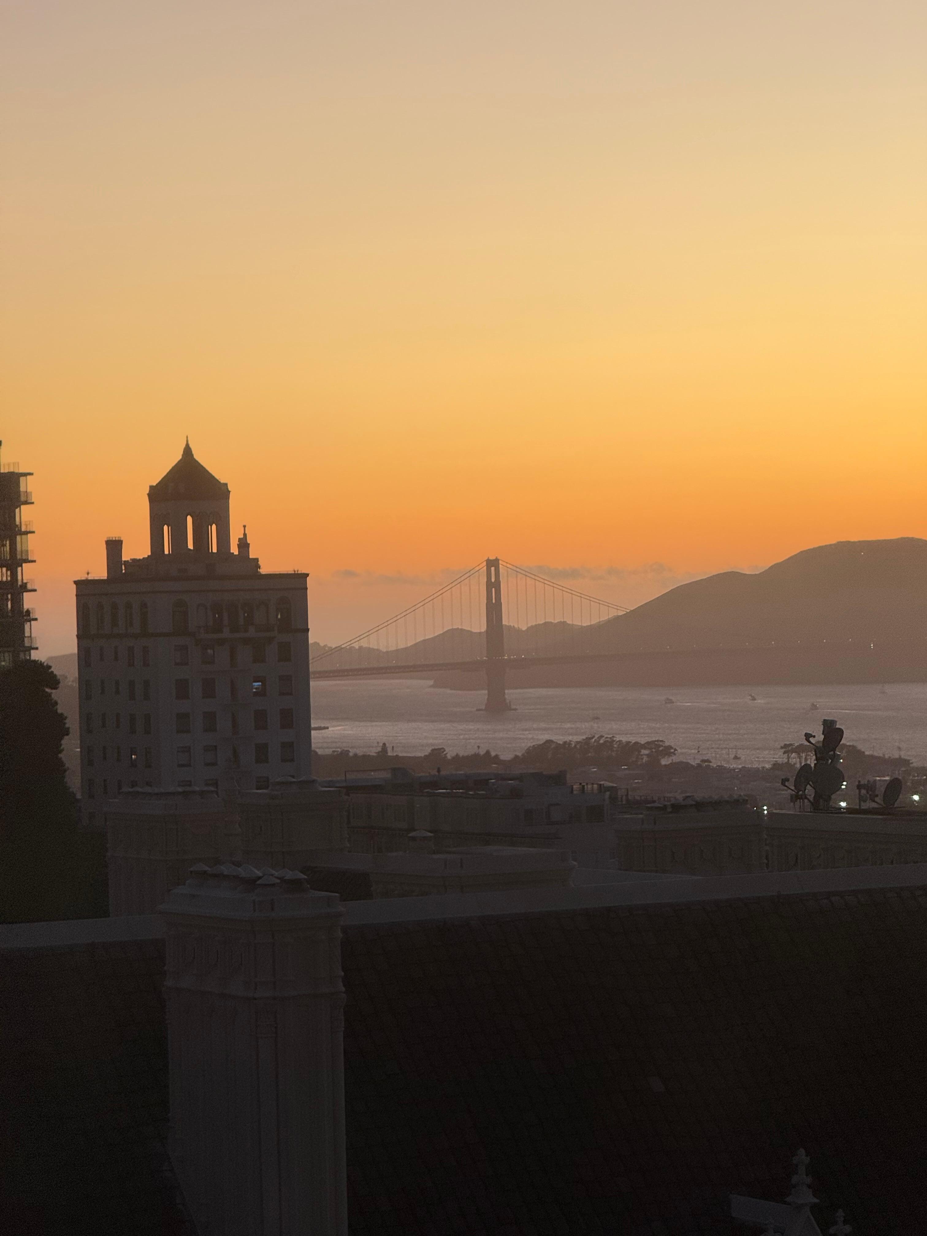 Sunset view from room of bay bridge 
