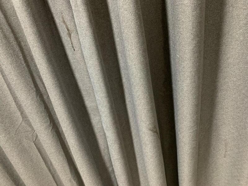 The filthy stained curtains
