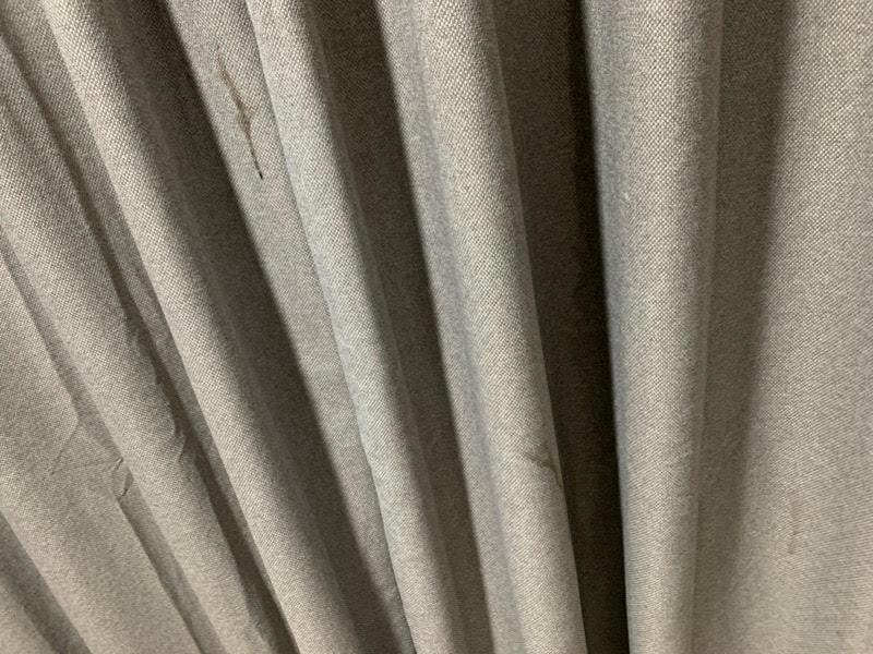 The filthy stained curtains