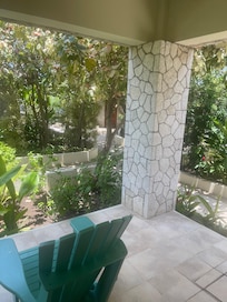 Garden cottage enjoying the view of the plants and trees