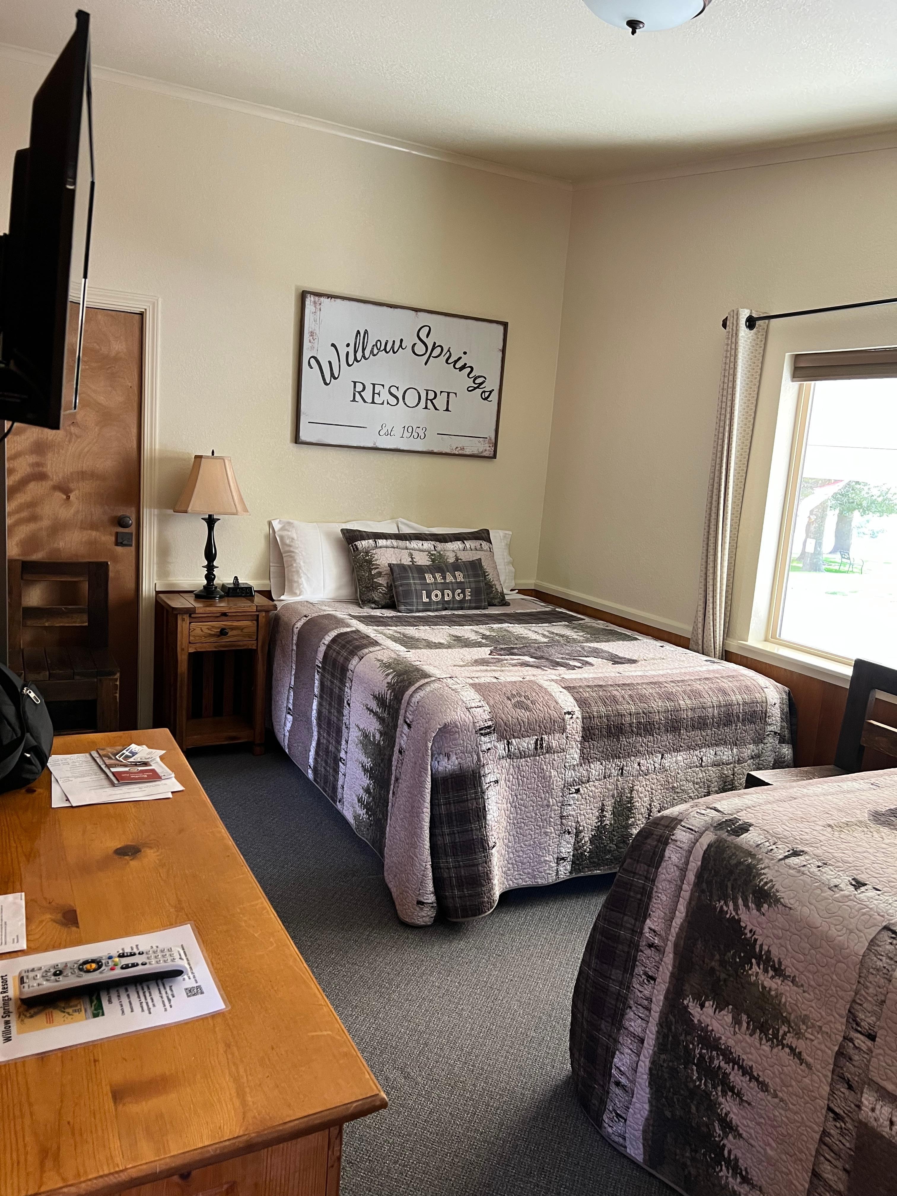 Two full sized beds with new mattress and beautiful quilts