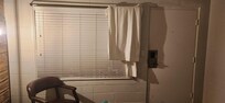Had to hang towels to block gap in the blinds for privacy.