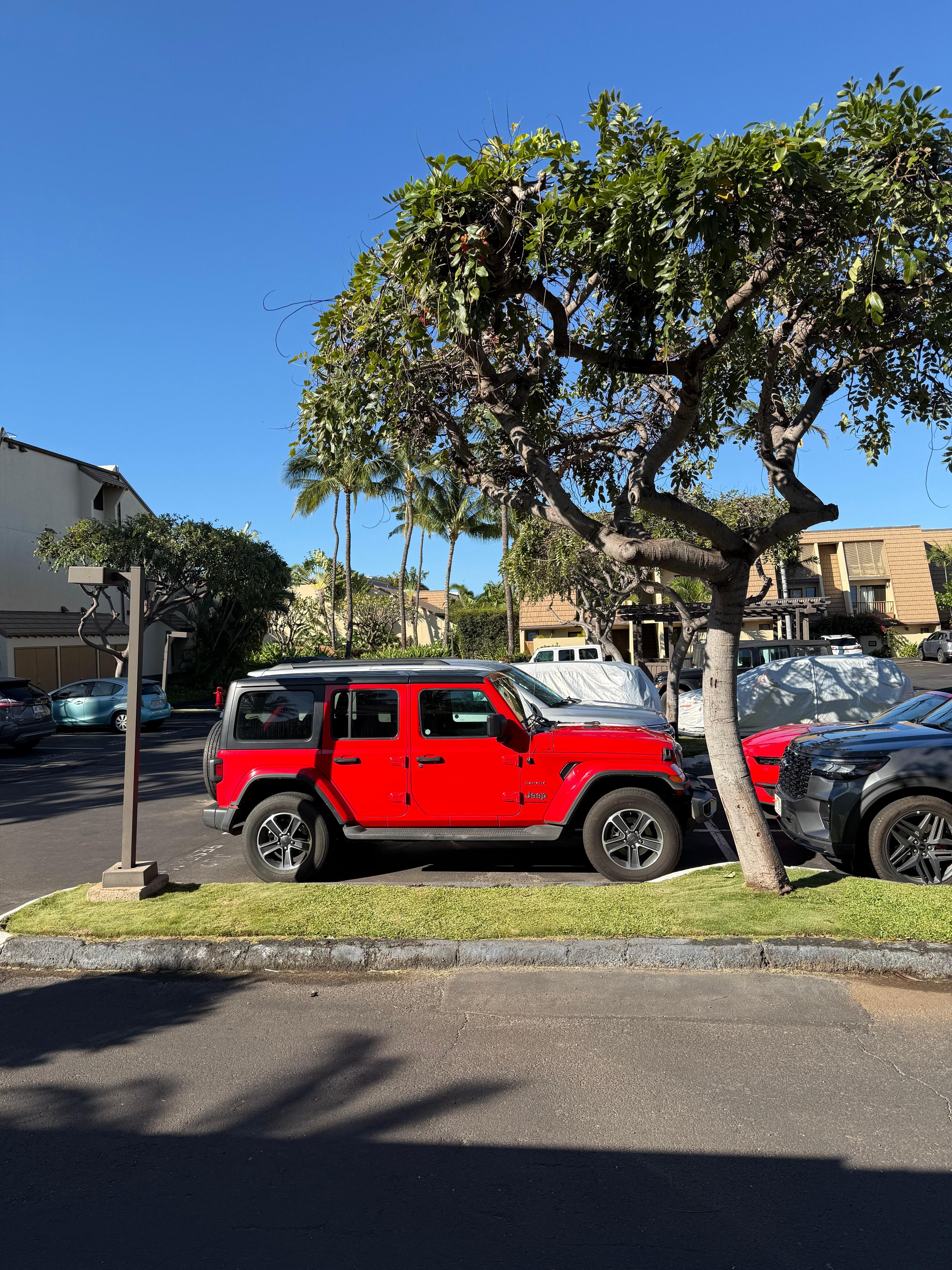 Our red Jeep parking spot from entrance area