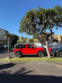 Our red Jeep parking spot from entrance area