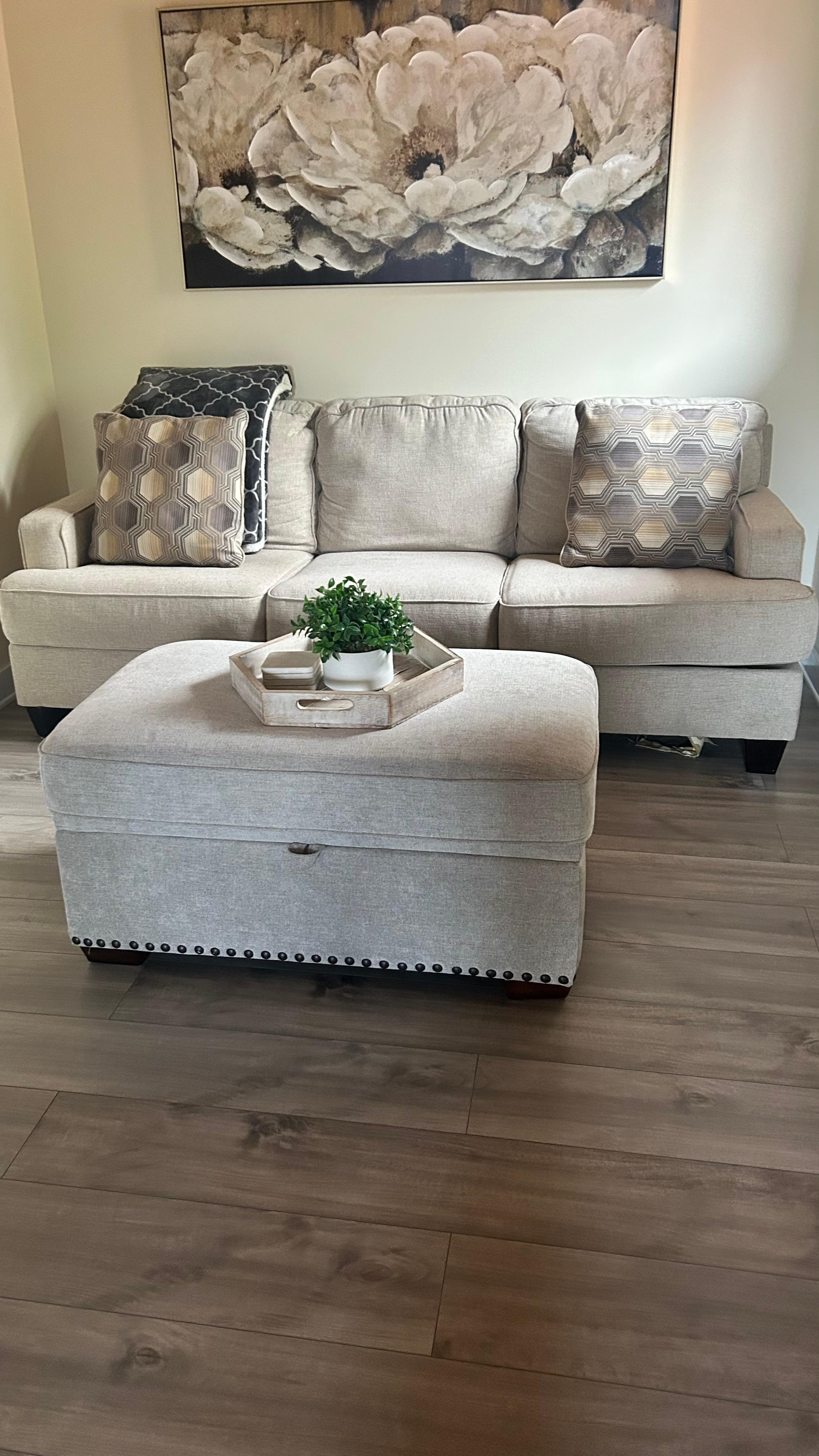 A nice little seating area at the top of the stairs.