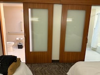 Two needs facing each bathroom