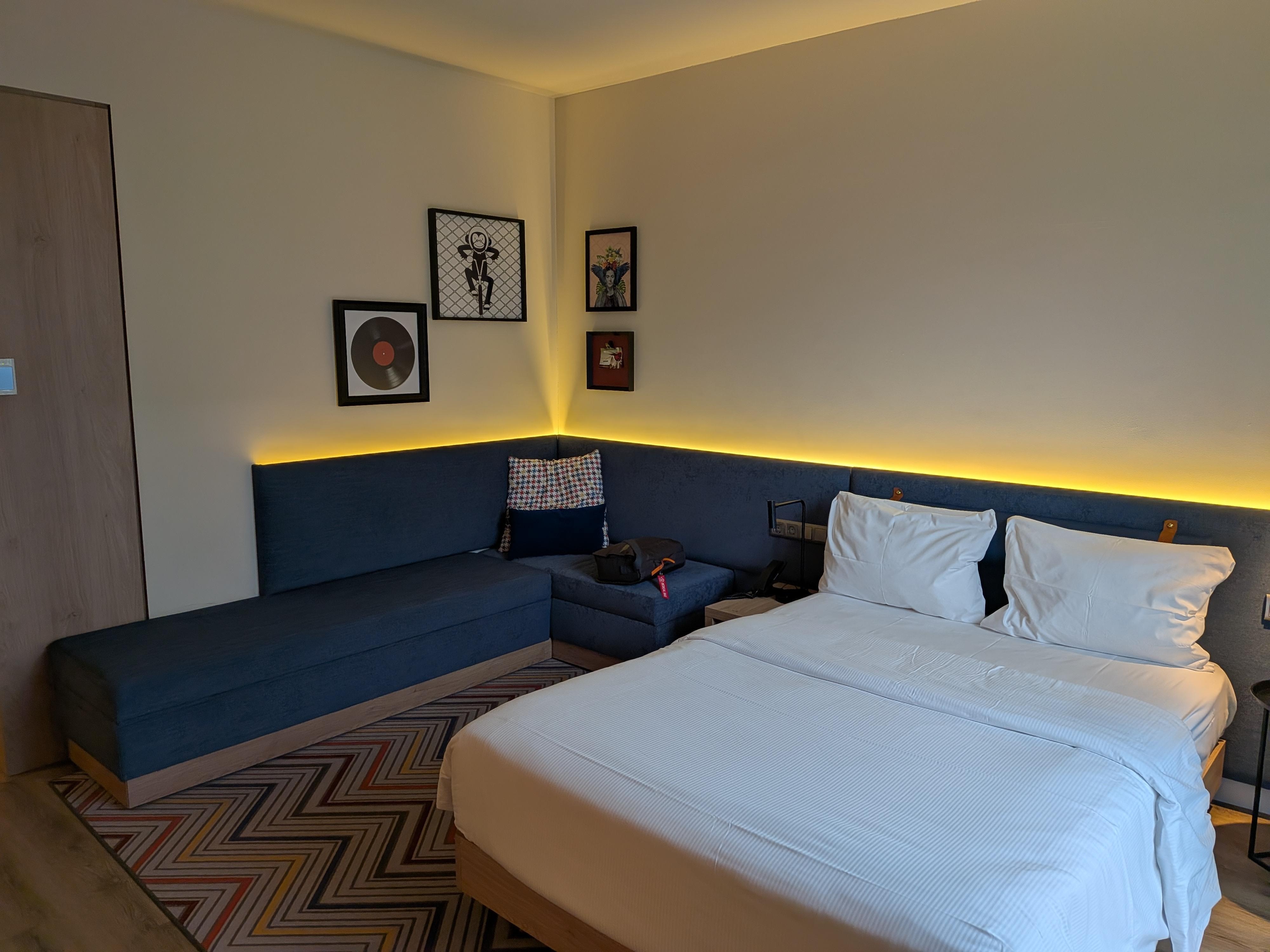 Bed and built-in couch. 