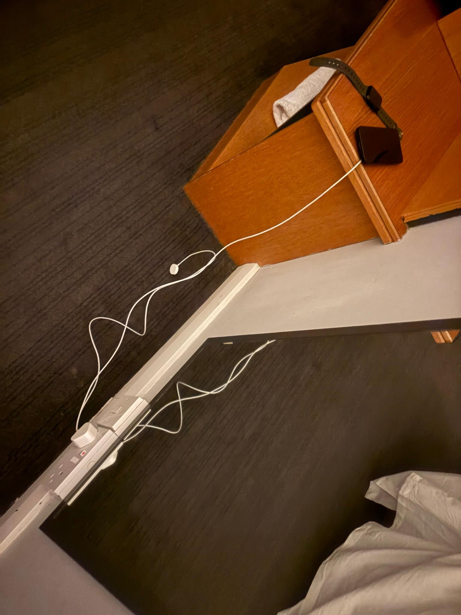 No sockets near bed for phone charging 