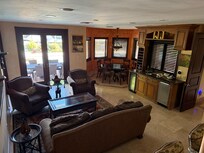 Living room area with wet bar area