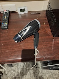 Unfortunately, the hair dryer is broken.