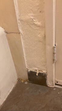 Bathroom wall next to tub
