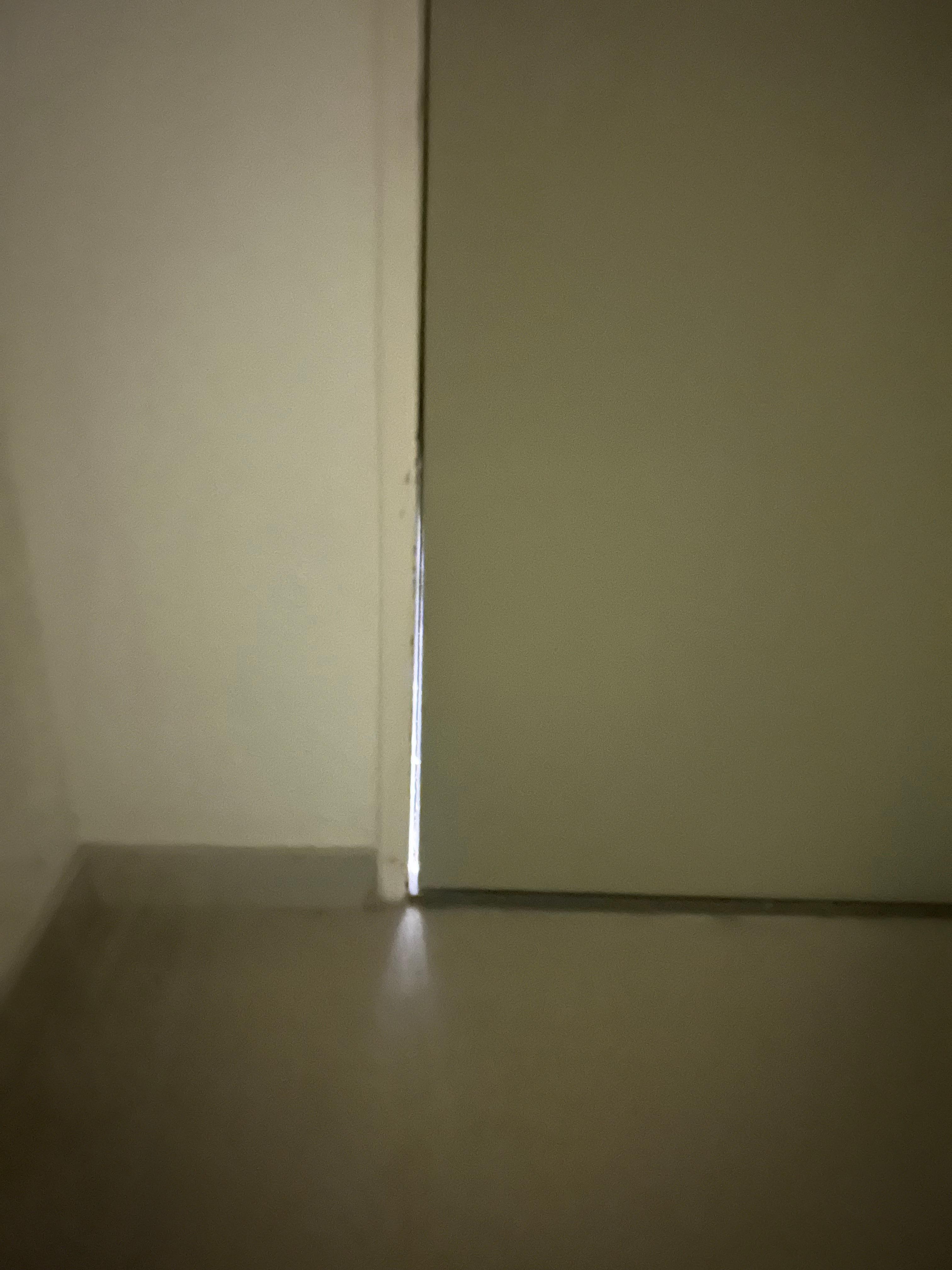 Gap in door so you could see the light in the hallway 