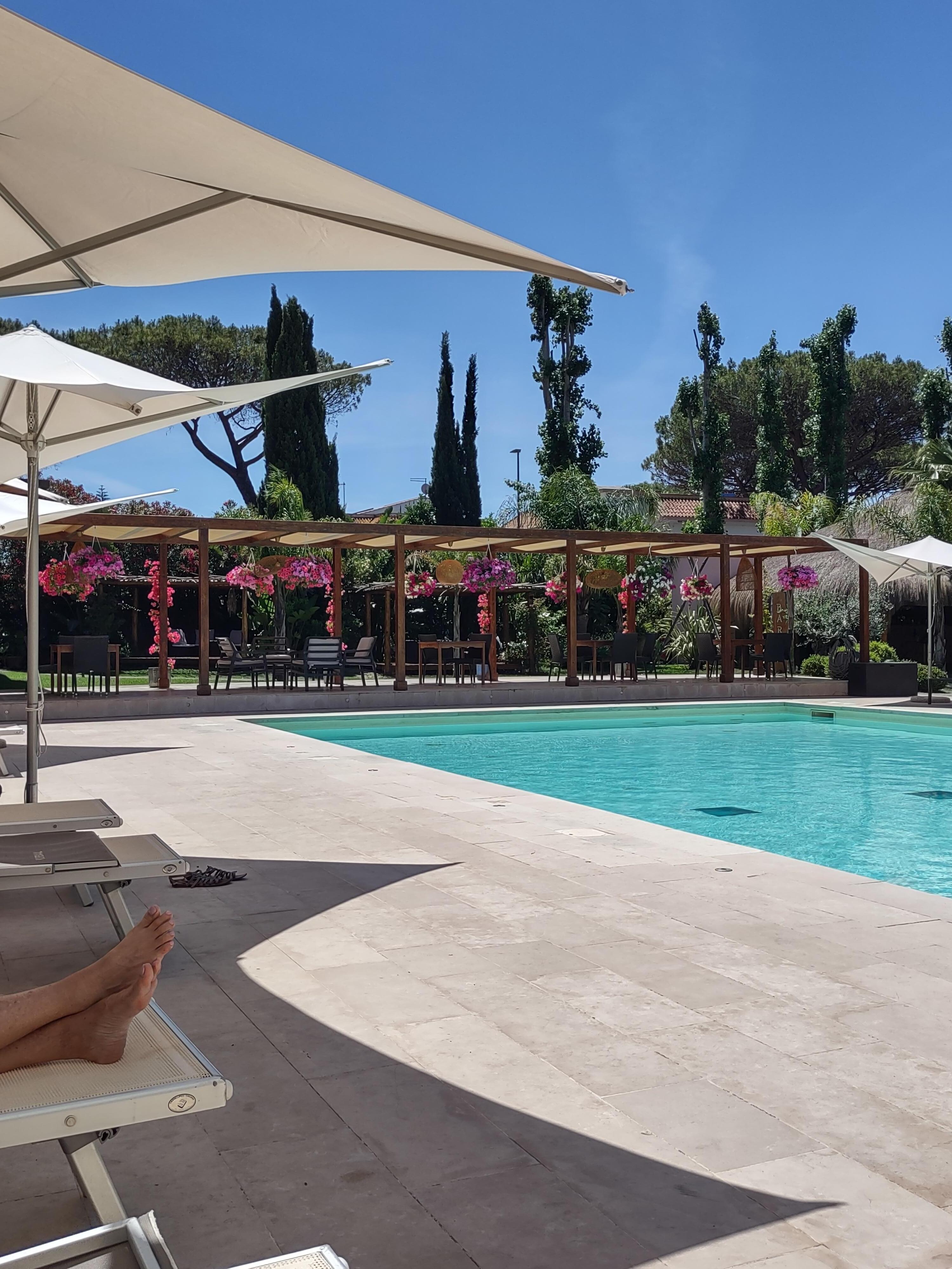 Beautiful pool and grounds with outdoor bar. 