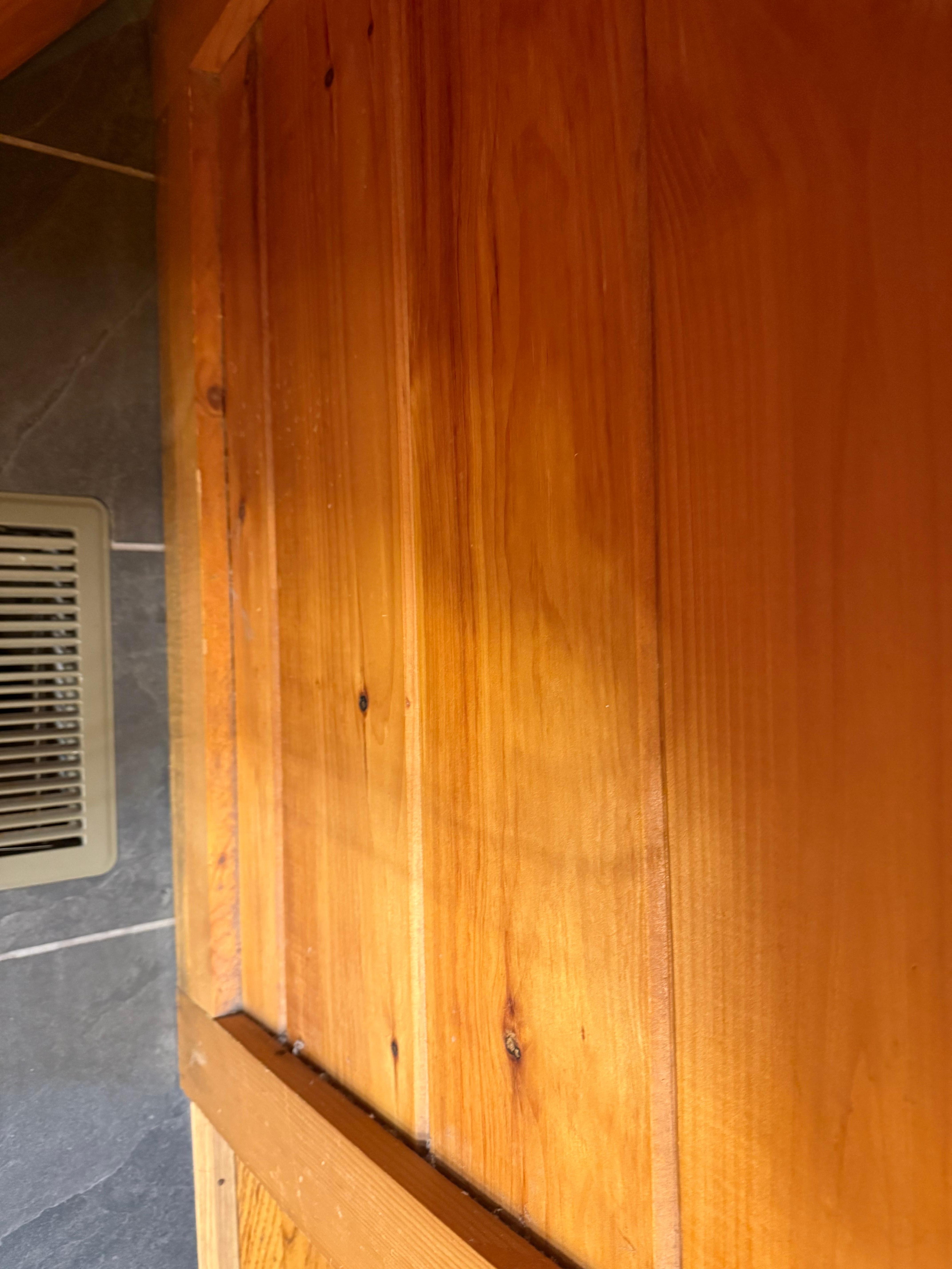 The wood walls were heavily dusty