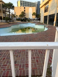 Pool directly in front of the building.