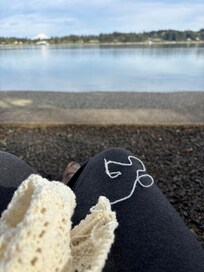 Finishing a kitting project in the comfy chairs by the beach.