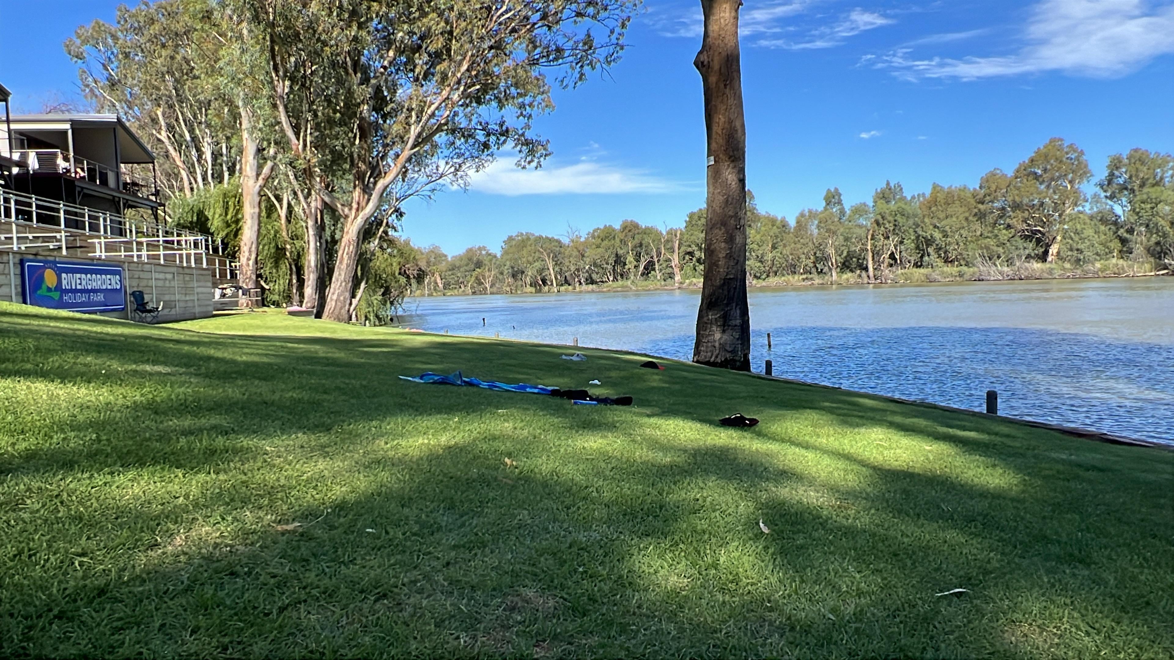 River frontage with posts to tie up boats.