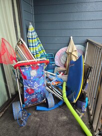Balcony area with leftover things of other people.