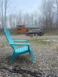 View of cabin and property from the fire pit