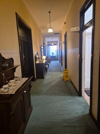Hallway with all bedrooms off.