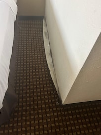Baseboard not attached to the wall