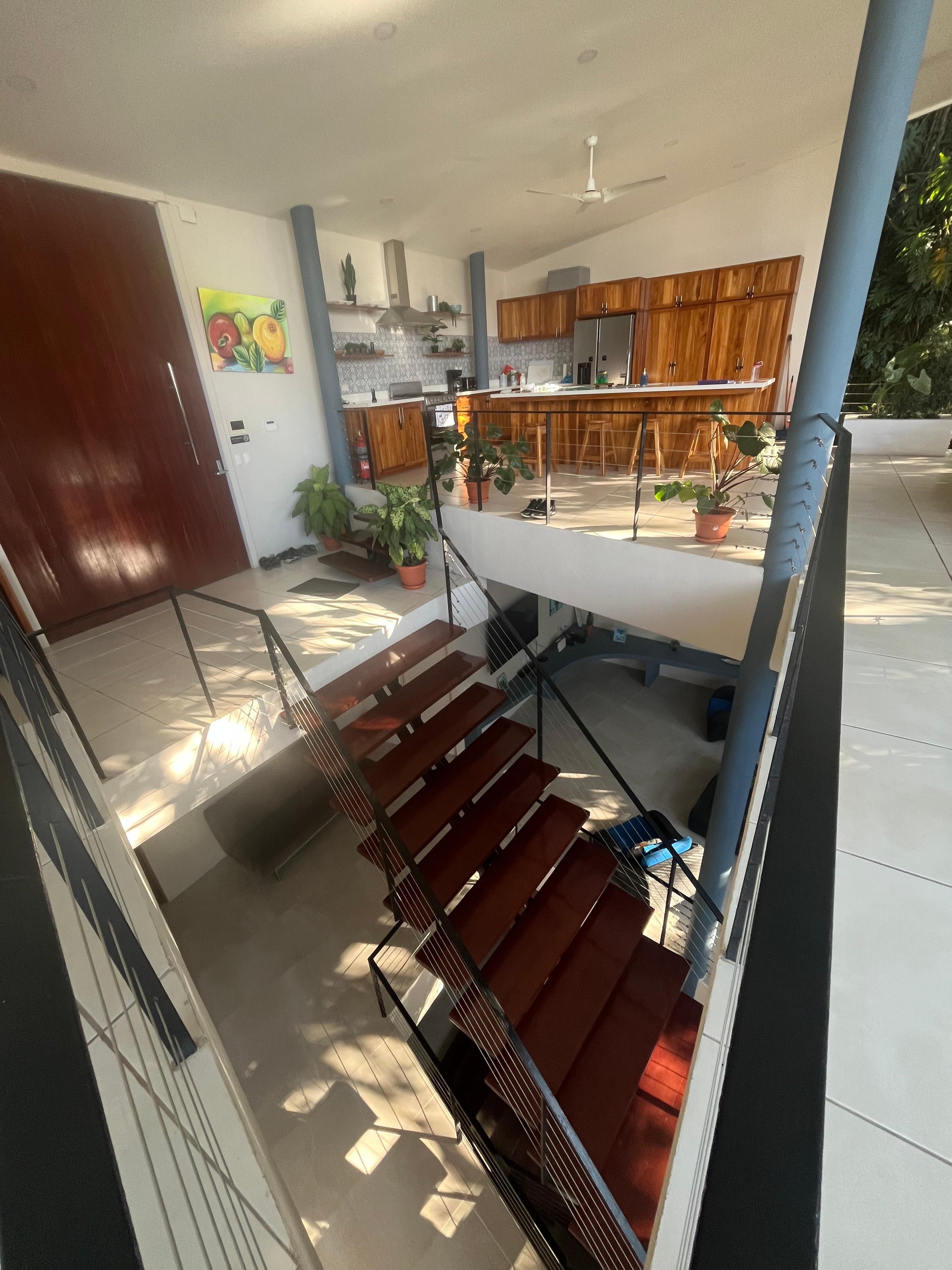 Three floors, open air with complete, kitchen and dining for large group.