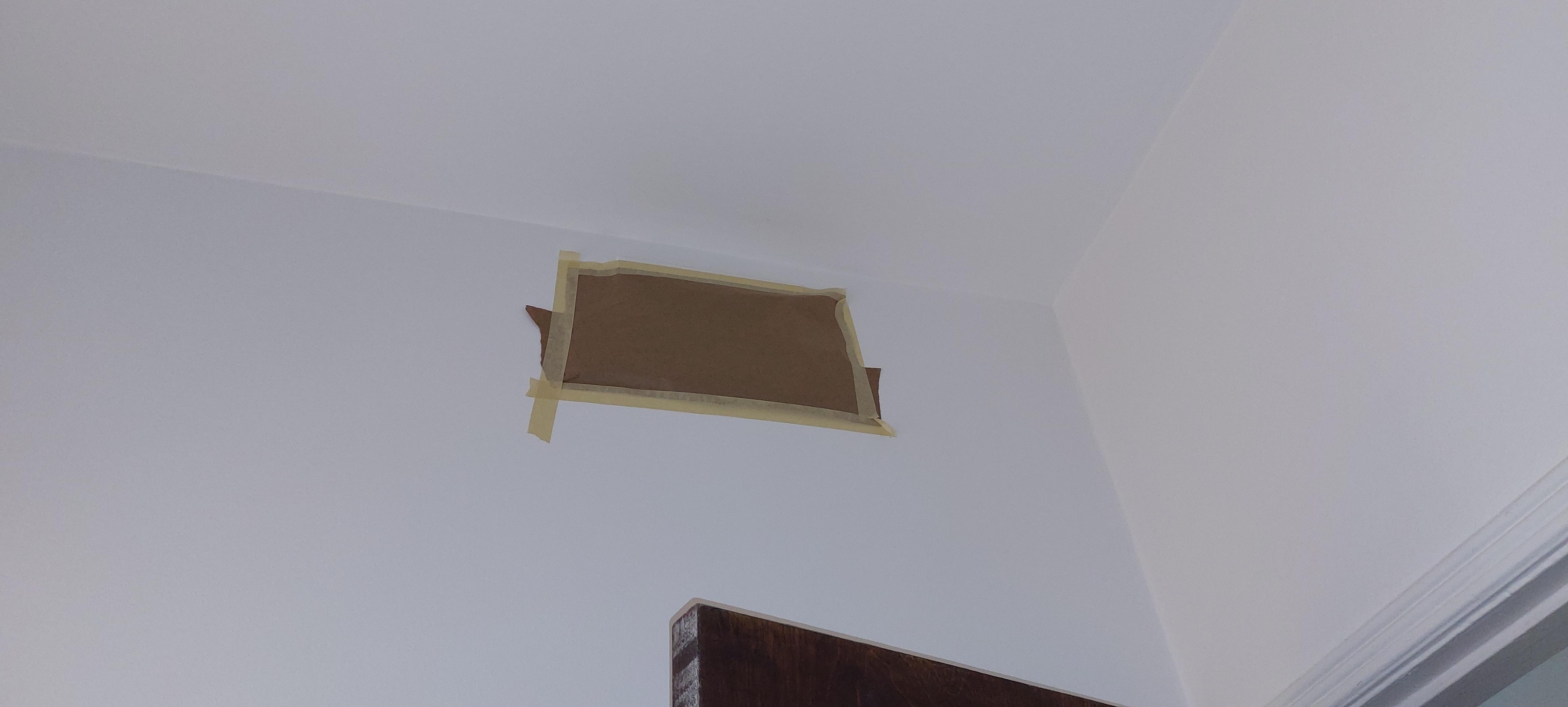 Taped vent in bathroom 