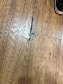Broken flooring sticking up.