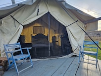 Outside looking into the canvas tent. Adventure awaits!