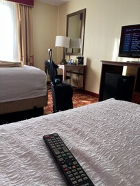 The room has both a microwave and refrigerator