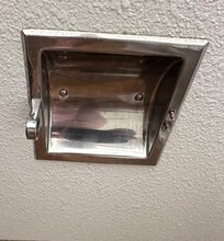 Broken toilet paper holder