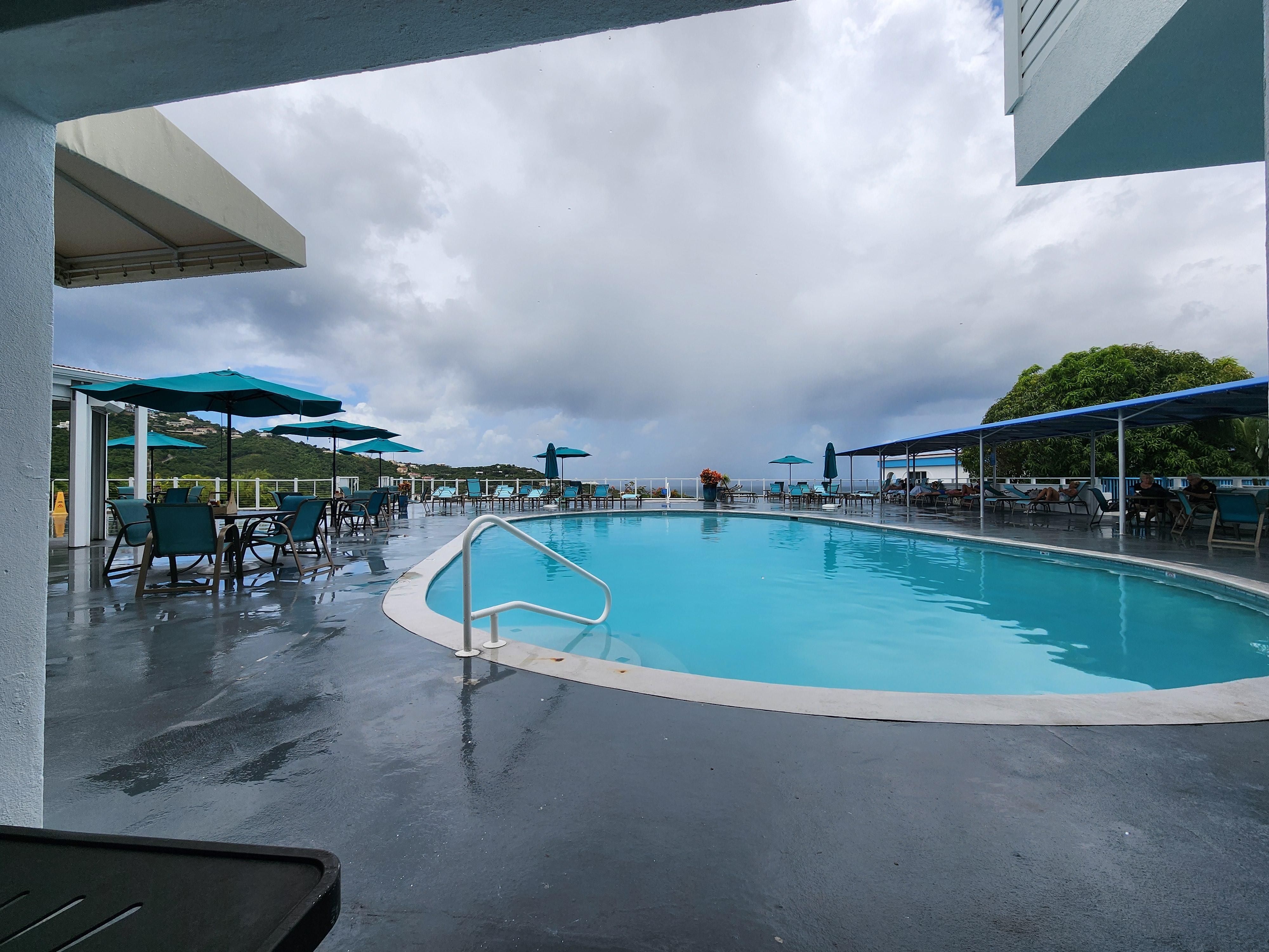 View of pool on rainy day