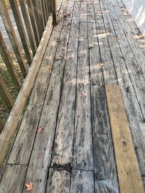 Holes in deck, uneven boards, nails sticking up