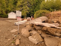 On the edge of the little park space to the private property
