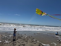 The kids loved flying kites on the beach.