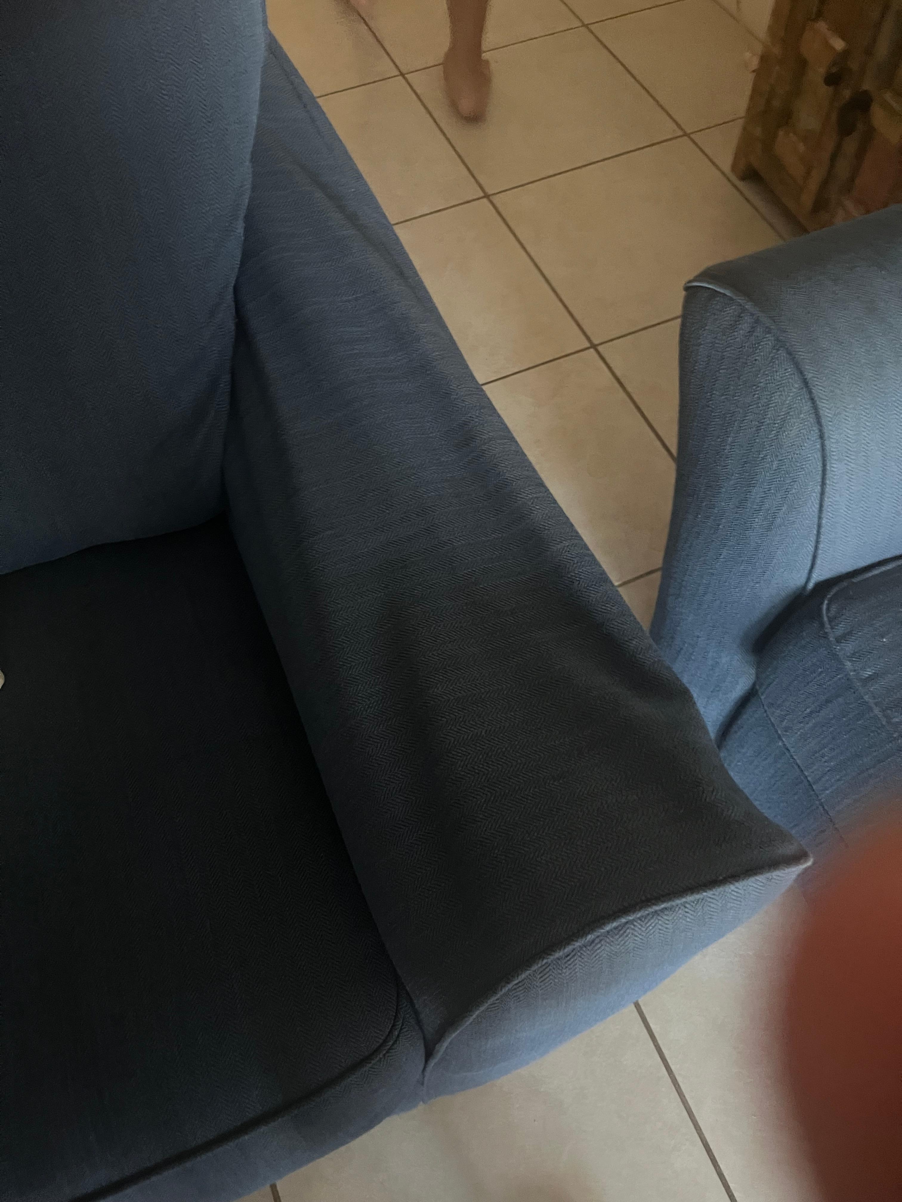 Couch arm just gone. Nothing underneath that cover. 