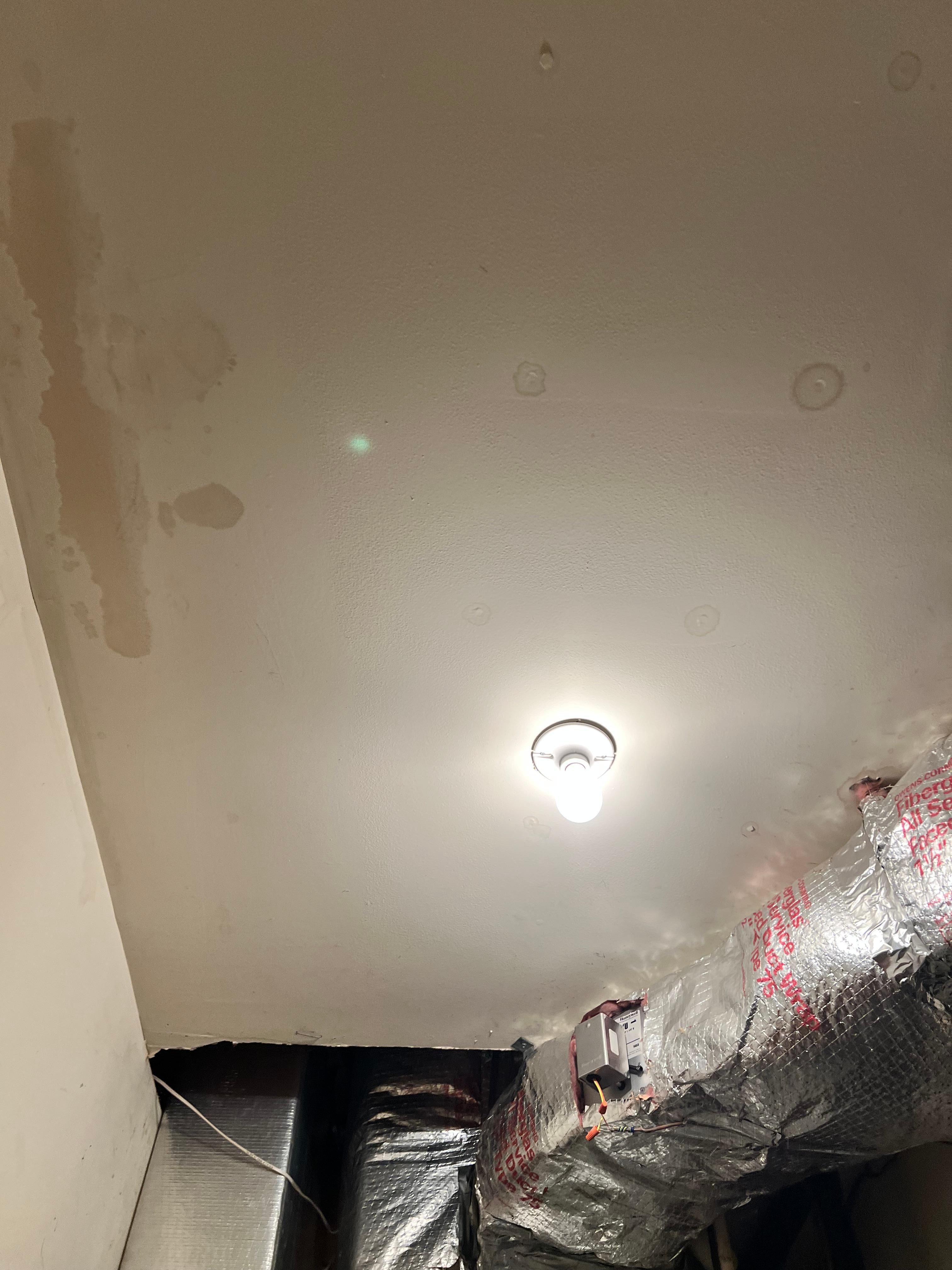 Other side of utility closet with no smoke detector 