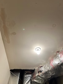 Other side of utility closet with no smoke detector